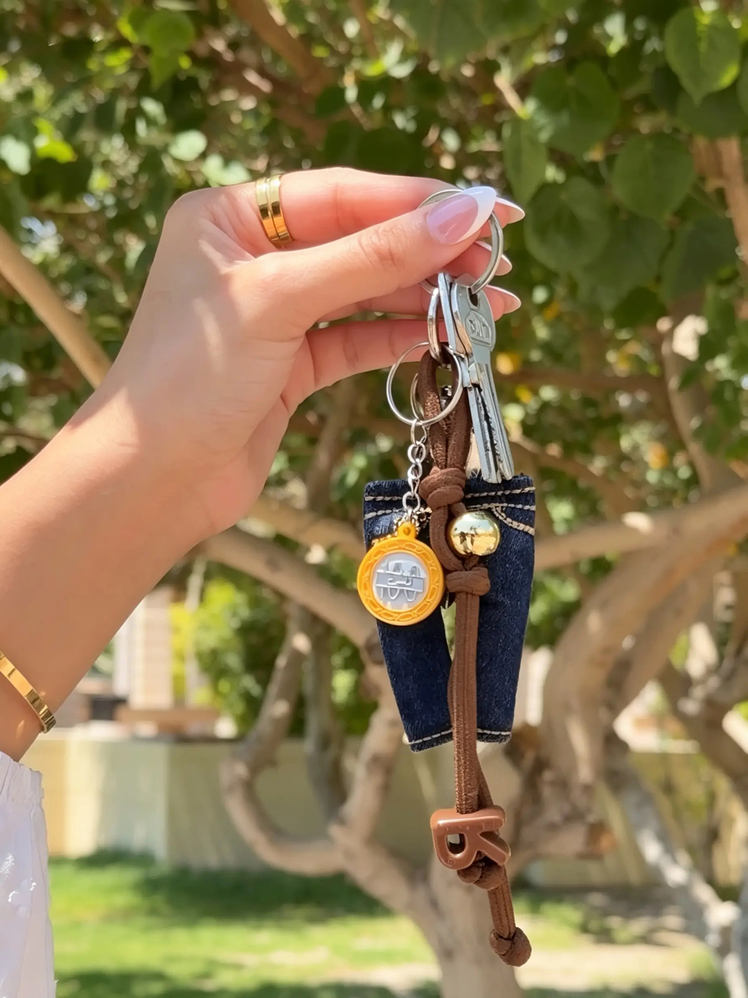 100 Fils Keychain